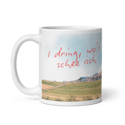 Linke Seitenansicht der Eninger Heimat-Tasse mit Achalm-Motiv und Spruch, Henkel links.