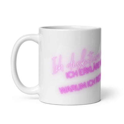 Weiße Kaffeetasse mit dem leuchtend pinken Neon-Spruch „Ich diskutiere nicht...“ auf der Rückseite.