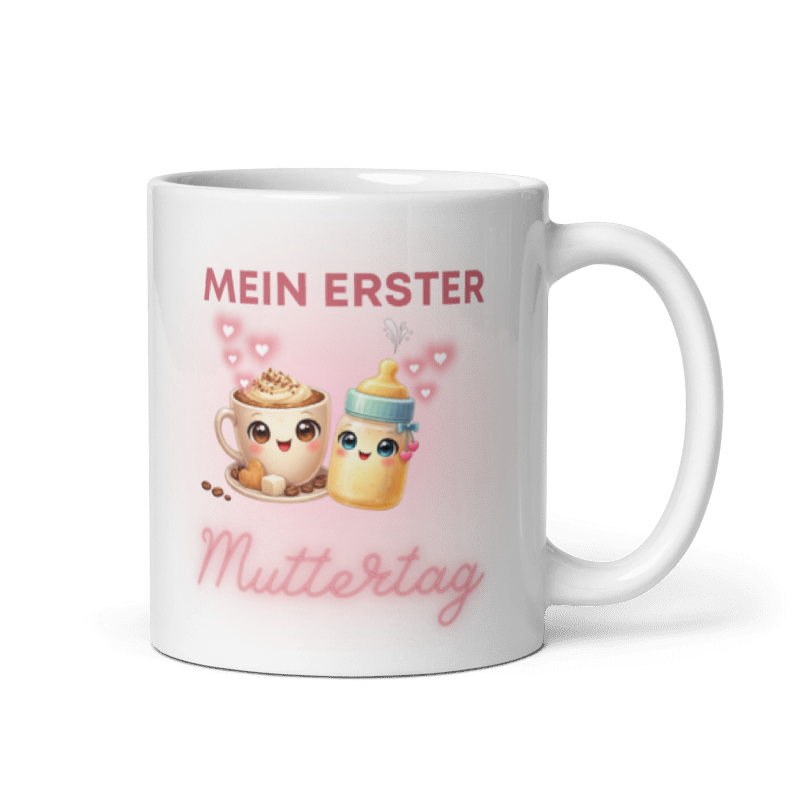 Weiße Keramiktasse mit dem Motiv Mein erster Muttertag, illustriert mit einer niedlichen Kaffeetasse, einem Babyfläschchen und rosa Herzen, Henkel auf der rechten Seite.
